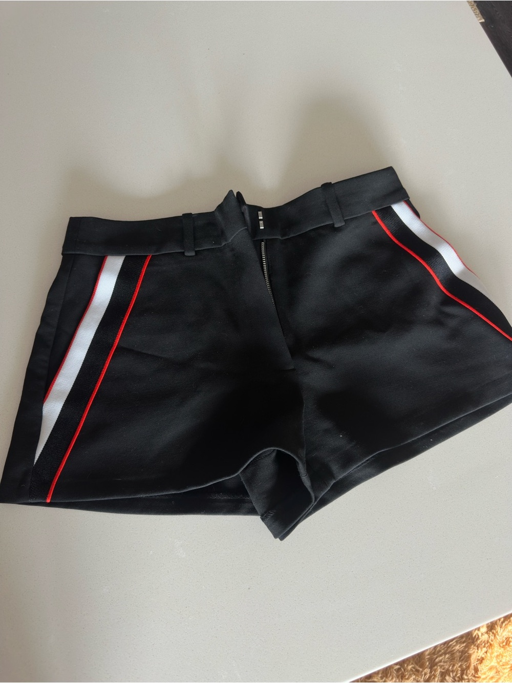 Babaton shorts with red and white strips